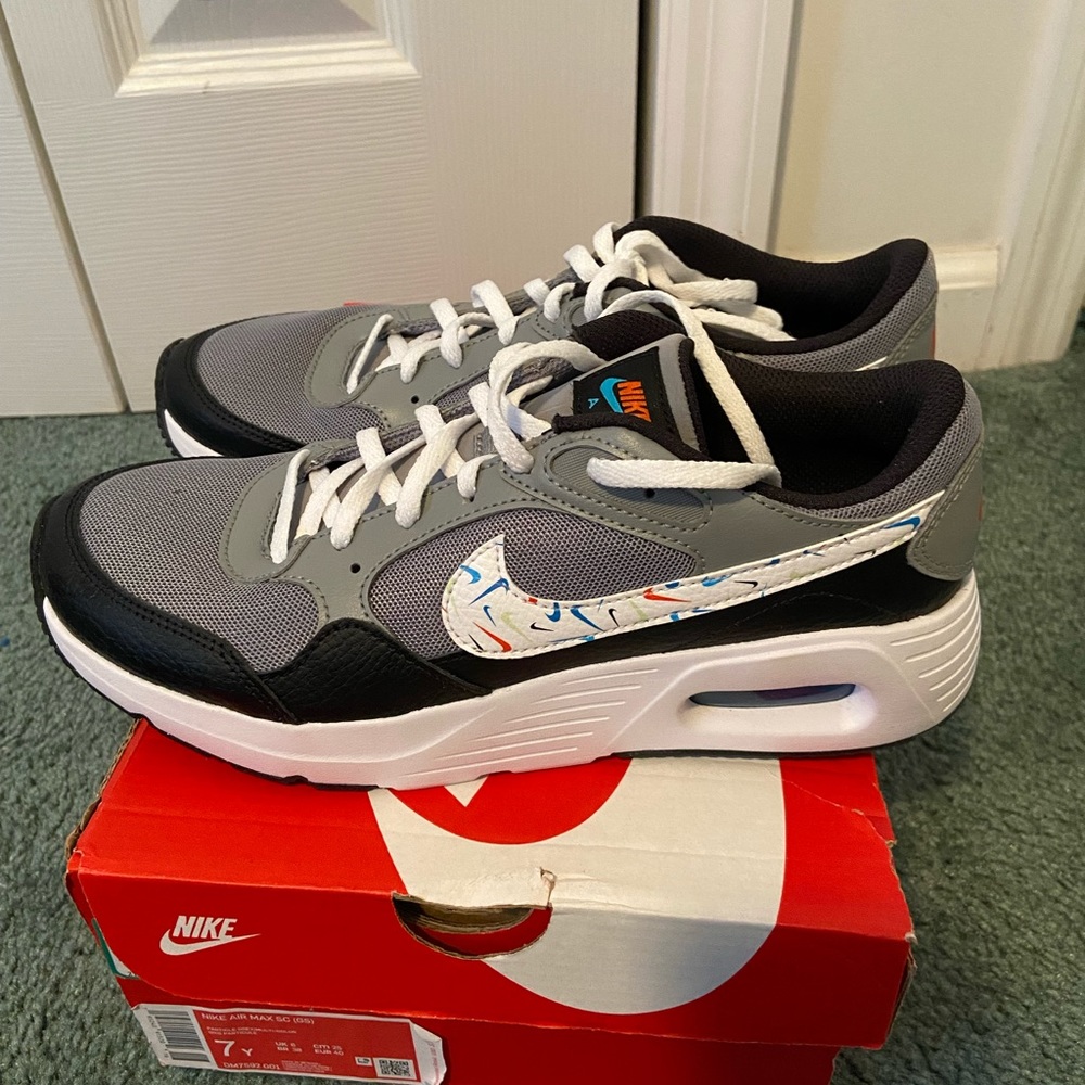 Nike Air Max SC youth size 7, will fit women size 8 1/2. Brand new in box